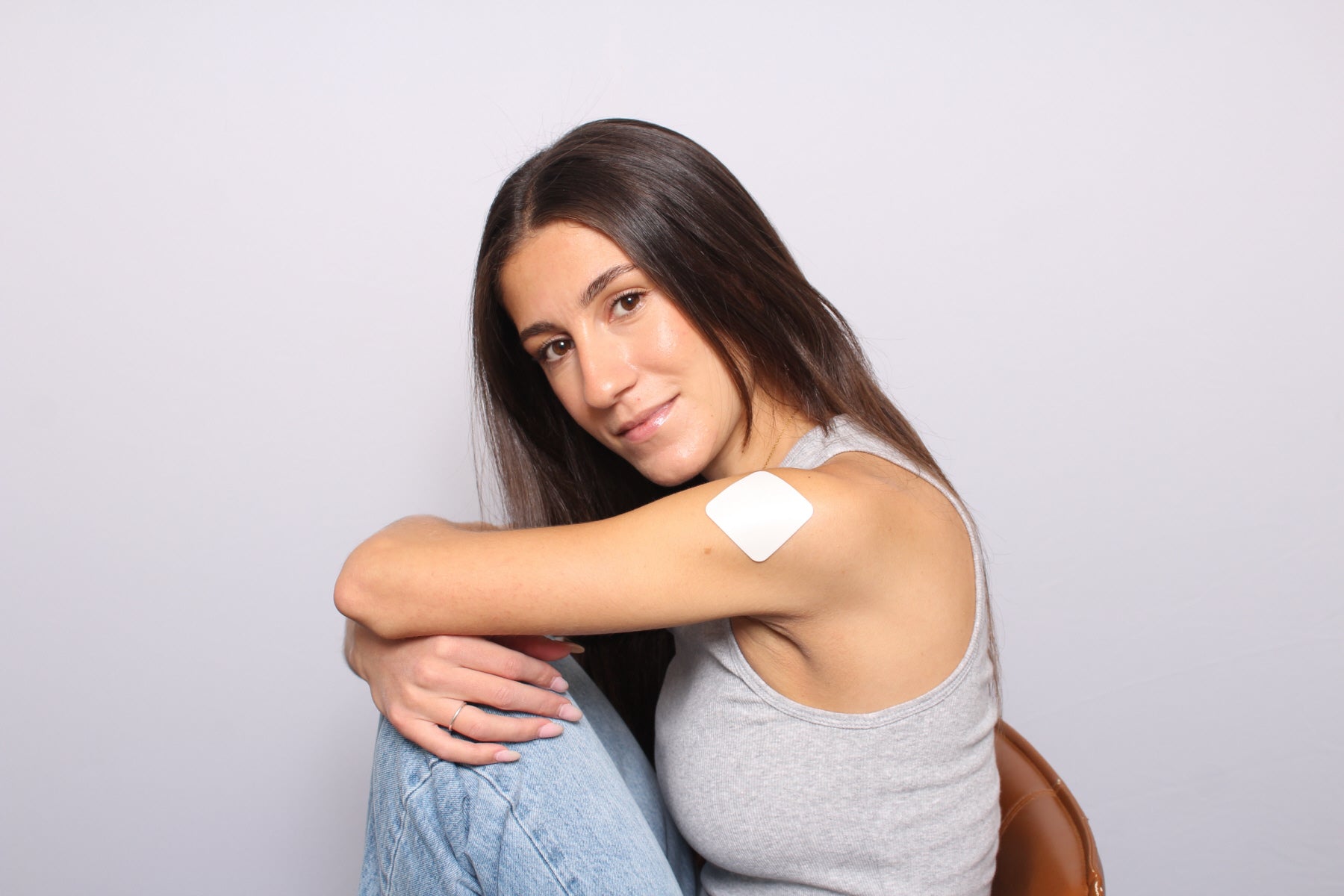 A woman sitting on the chair.